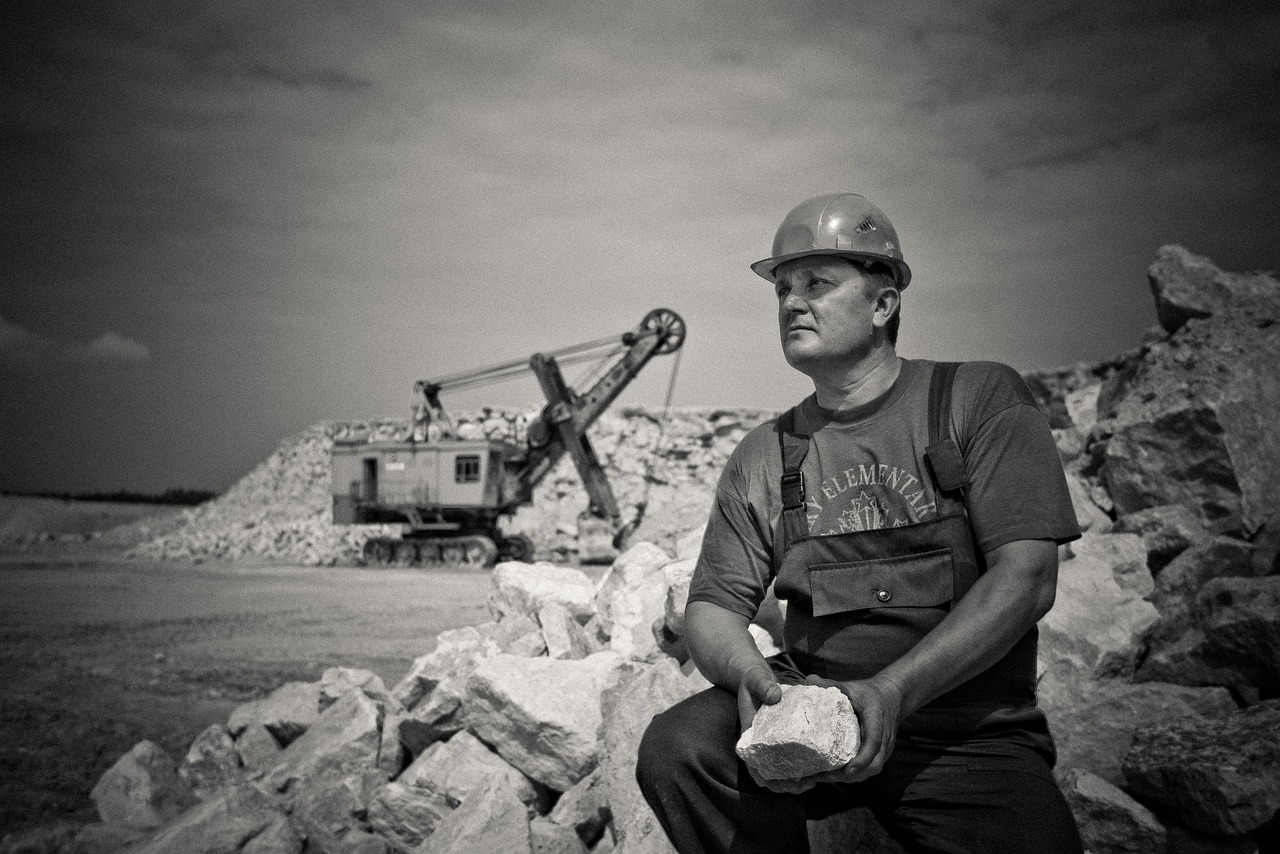 Mining supplier with hard hat on site