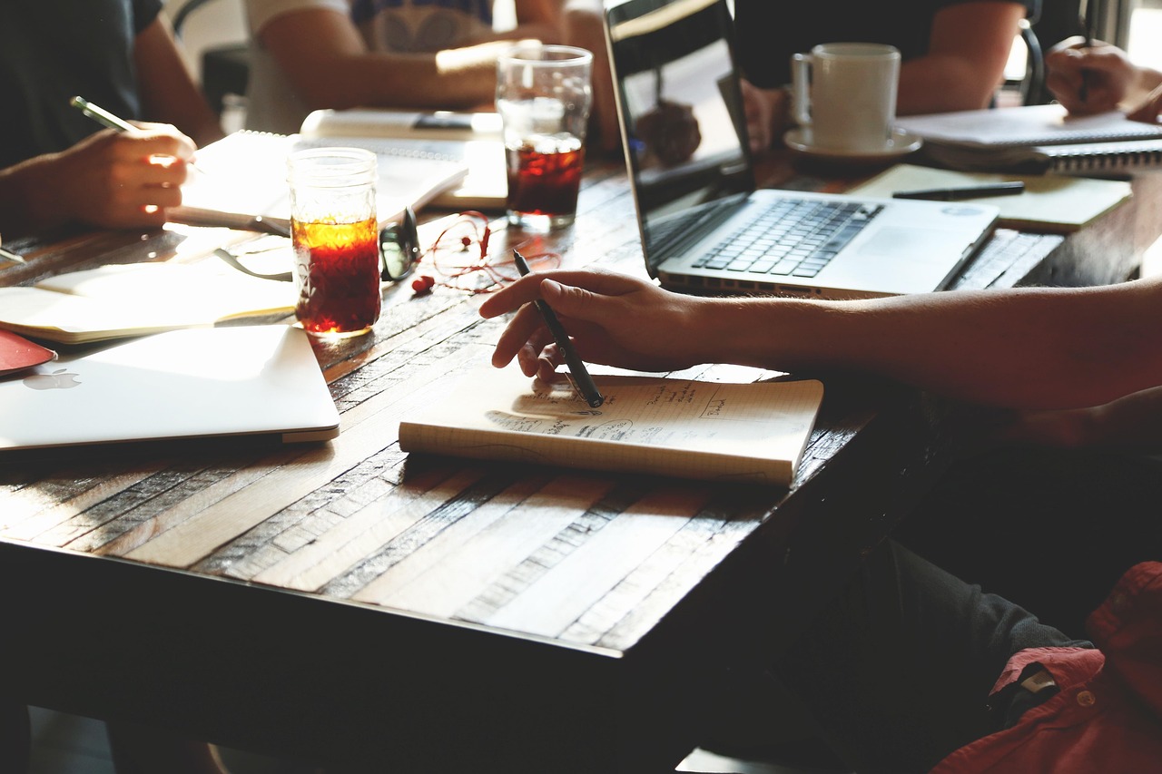 Business partners collaborating within a structured network